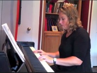 Jennifer Savitch plays two beginner songs.