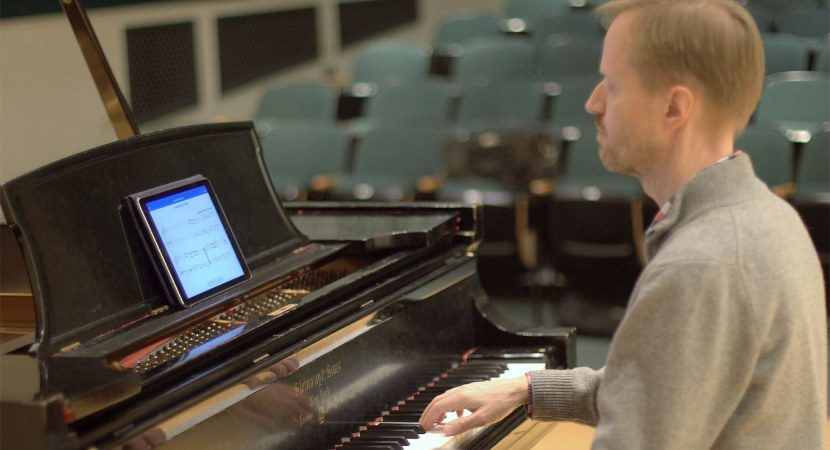Read_Ahead_sight_reading_app creator playing the piano