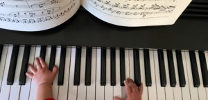 Baby hands playing piano